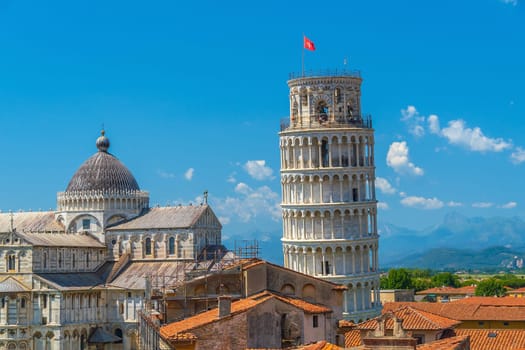 The famous Leaning Tower in Pisa, Italy with beautiful blue sky