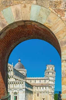 The famous Leaning Tower in Pisa, Italy with beautiful blue sky