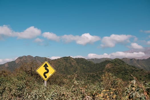 Curvy signpost on the Los Lagos trails in the Potrero de Yala Provincial Park in Jujuy, Argentina.