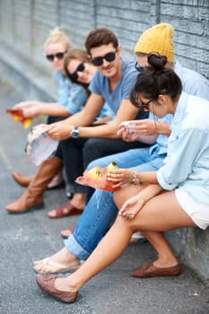 Street, friends and people with animal mask for fashion party, bonding and talking. Group, sunglasses and dress up in city, stylish men and women or hipsters sitting outdoor together for Halloween.