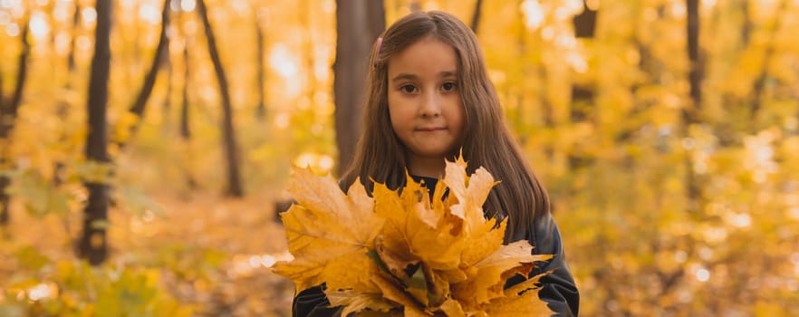 Autumn portrait of cute little asian girl copy space. Children, fall and season concept