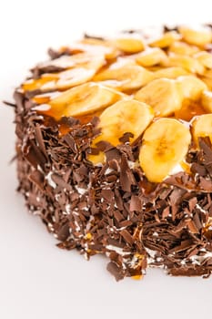 Banana dessert cake with dark chocolate topping sweet treat