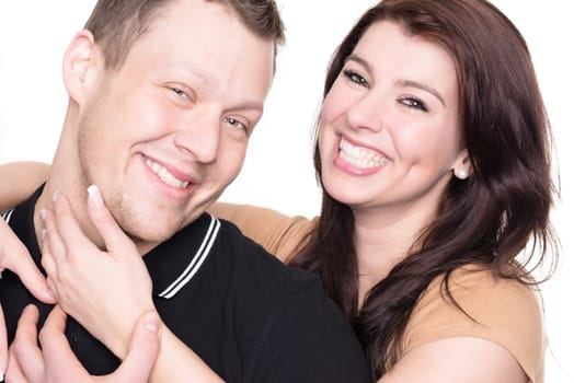 Studio shot of a young couple against a white background
