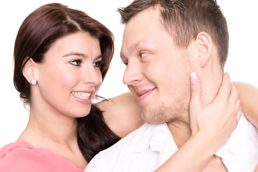 Studio shot of a young couple against a white background