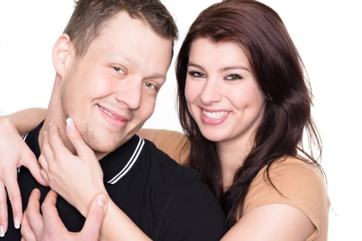 Studio shot of a young couple against a white background