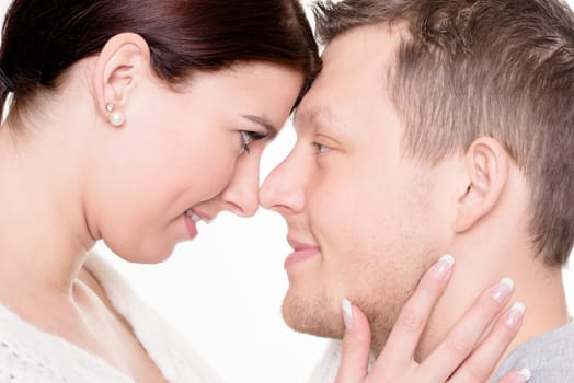 Studio shot of a young couple against a white background