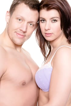 Studio shot of a young couple against a white background