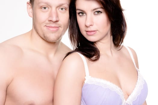 Studio shot of a young couple against a white background