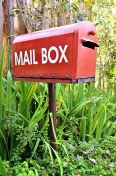 red mail box in the garden