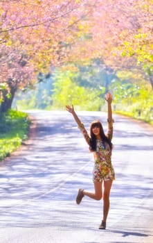 Happy woman on the road