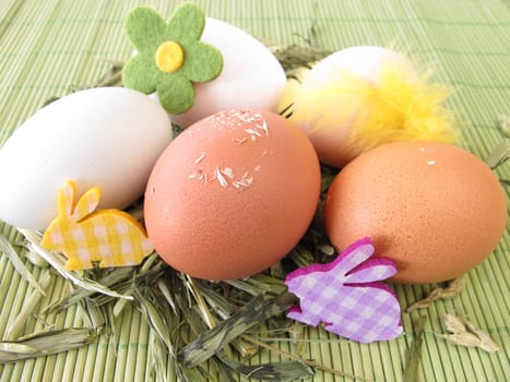 Naturally coloured eggs in the Easter basket