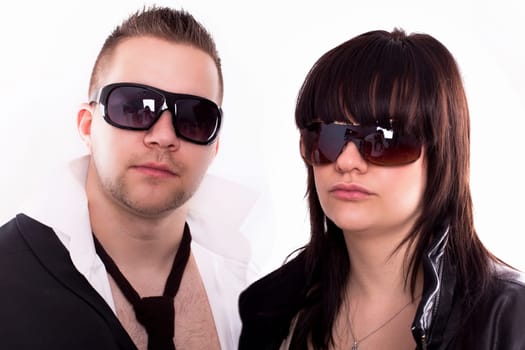 Young modern couple with sunglasses