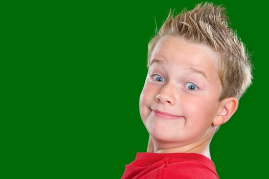 happy boy in front of green background