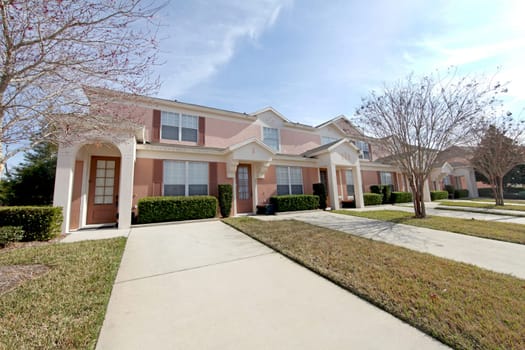A set of pink townhomes in Florida