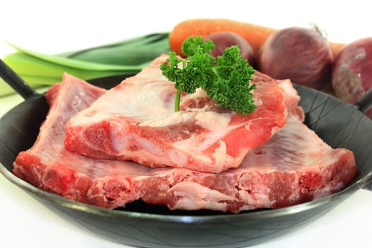 two pieces of peeled ribs against a white background
