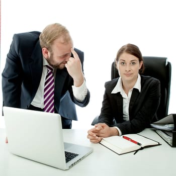 beard business man brunette woman at desk employee is stupid