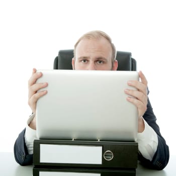 business man hide behind laptop and document