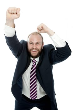beard business man wins with arms in the air