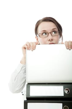 young brunette business woman with glasses hiding behind laptop