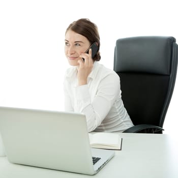 young brunette business woman call cell phone behind desk