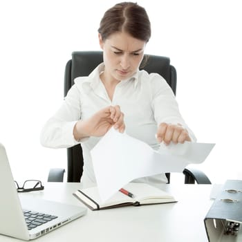 young business woman tear paper on desk