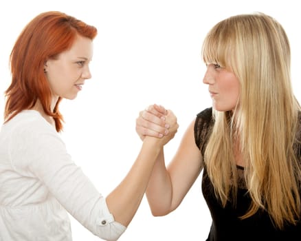 young beautiful red and blond haired girls in front of white background