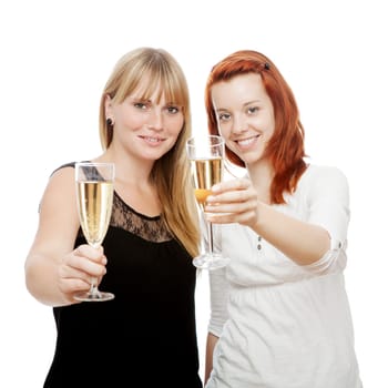 young beautiful red and blond haired girls in front of white background