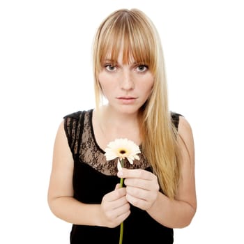 young beautiful blond haired girl plays he loves me in front of white background