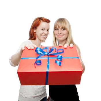 young beautiful red and blond haired girls in front of white background