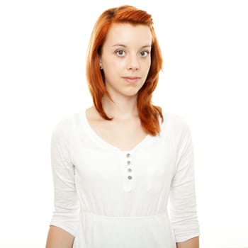young beautiful red haired girl in front of white background