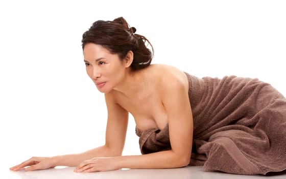 beautiful asian brunette nude on white isolated background