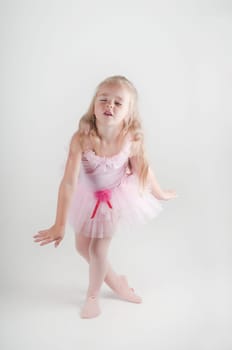 Studio shot of dancing ballet dancer girl