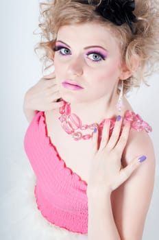 Portrait of young beautiful sexy tender blonde with fancy make-up