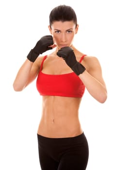 athletic brunette posing as american football girl on black background
