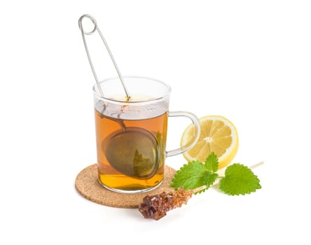 Hot cup of tea with strainer