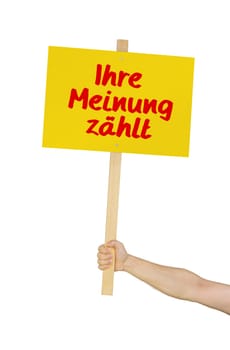 Person holding sign that reads Your Opinion Matters