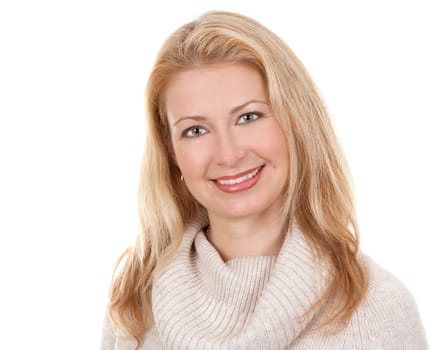 pretty blond woman wearing beige sweather on white background