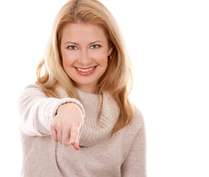 pretty blond woman wearing beige sweather on white background