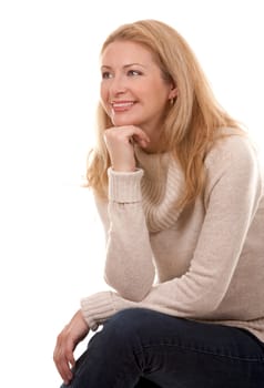 pretty blond woman wearing beige sweather on white background
