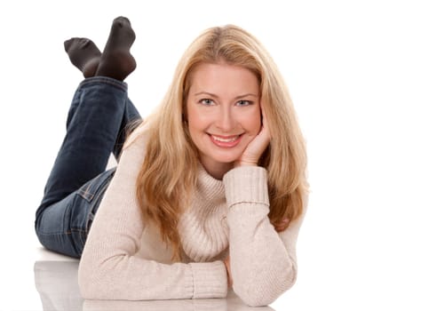 pretty blond woman wearing beige top sitting on white background