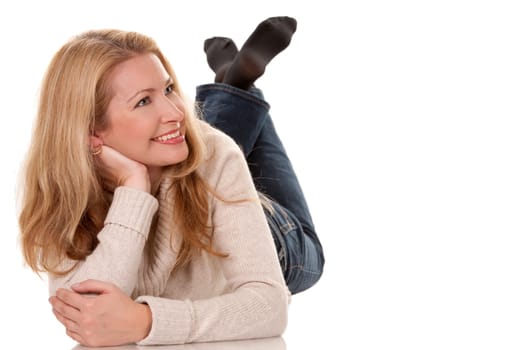 pretty blond woman wearing beige sweather on white background