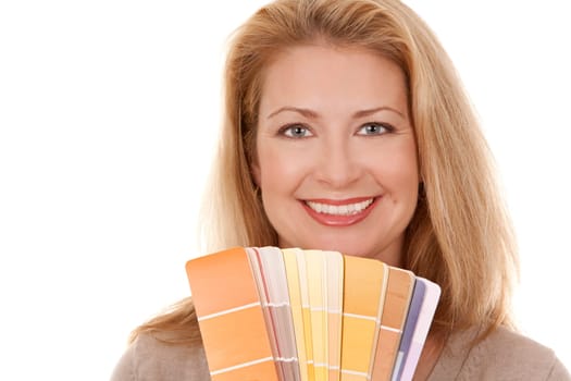 pretty blond woman holding color chart on white isolated background