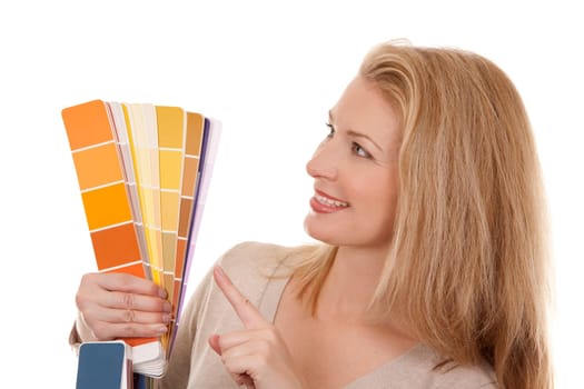 pretty blond woman holding color chart on white isolated background
