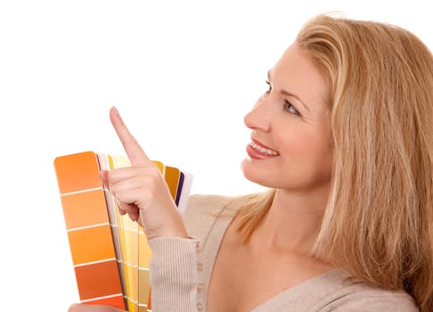 pretty blond woman holding color chart on white isolated background