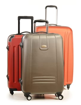 Luggage consisting of large polycarbonate suitcases isolated on white