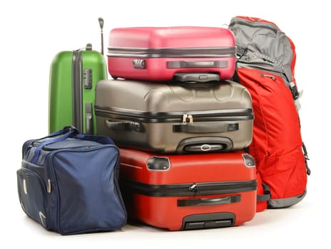 Luggage consisting of large suitcases rucksack and travel bag isolated on white