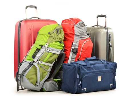 Luggage consisting of large suitcases rucksacks and travel bag isolated on white