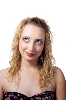 Happy young woman looking up