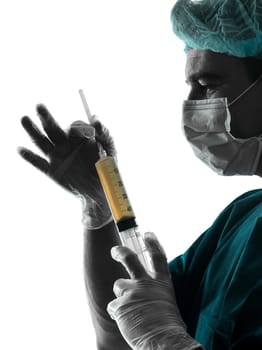 one caucasian doctor suegon  Anesthetist man holding surgery needle  silhouette isolated on white background
