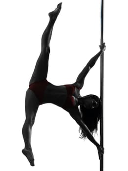 one caucasian woman pole dancer dancing in silhouette studio isolated on white background